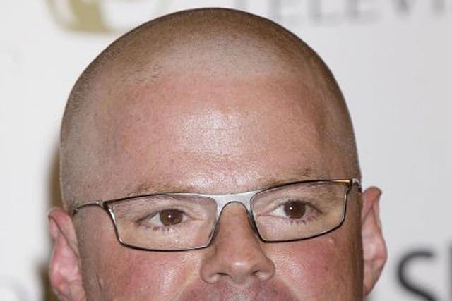 Heston Blumenthal is favourite to cook the ?200,000 burger made from 3,000 strips of
synthetic meat protein
