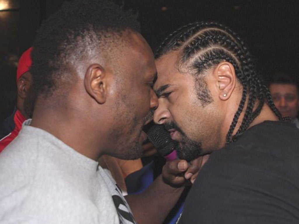 Dereck Chisora and David Haye square up before fighting breaks out