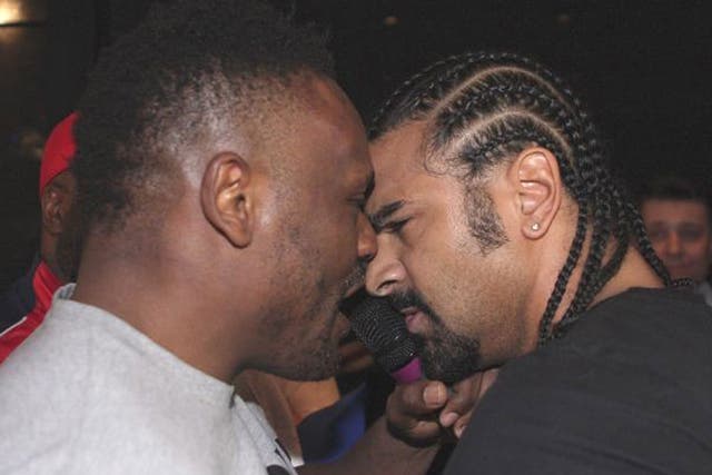 Dereck Chisora and David Haye square up before fighting breaks out