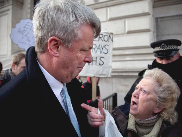 Andrew Lansley, the Health Secretary, was
confronted by protesters yesterday on his way
to a summit about his proposed reforms of the
health service. June Hautot, a veteran
campaigner, disputed his pledge not to introduce
charging