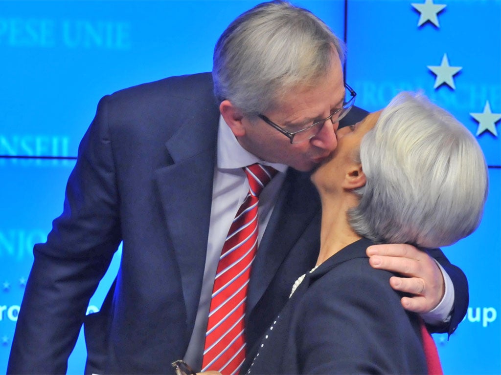 Eurogroup president Jean-Claude Juncker and IMF managing director Christine Lagarde after the bailout was secured in Brussels