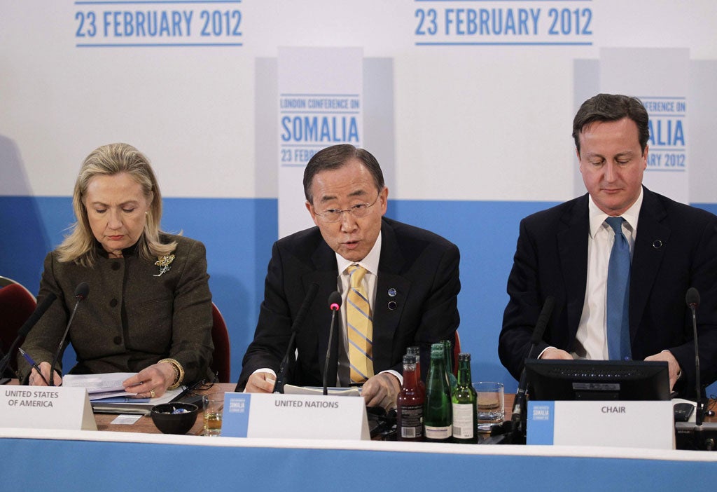 UN Secretary-Genaral Ban Ki-Moon, Prime Minister David Cameron and US Secretary of State Hillary Clinton listen during the Somalia Conference at Lancaster House