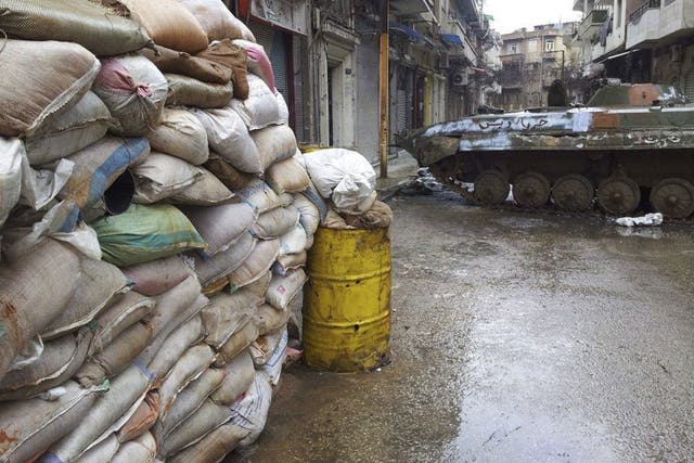 A damaged tank in the Bab Sabaa neighbourhood of Homs 