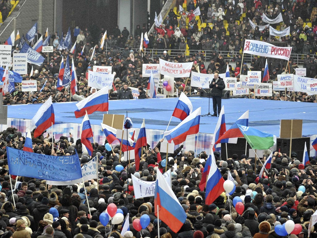 The pro-Putin rally was held on Defenders of the Fatherland day, a national holiday that replaced the Soviet-era Red Army Day