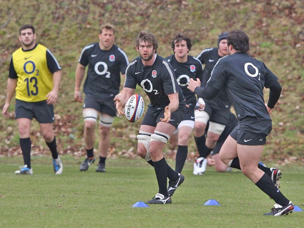 Geoff Parling passes during training in Bagshot yesterday