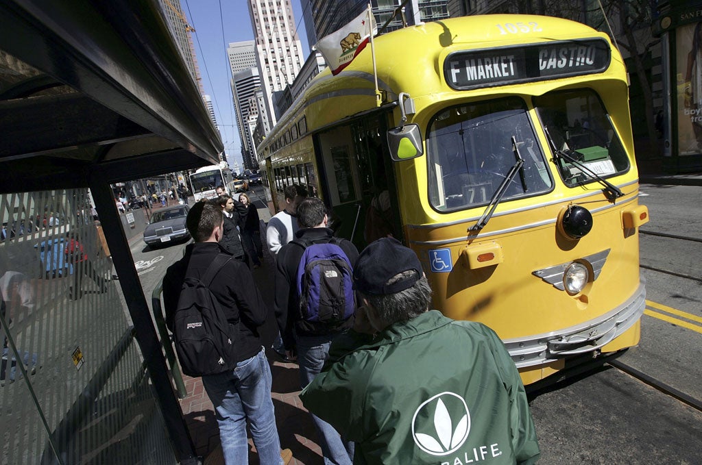 Public service: Passengers board one of San Francisco's historic streetcars