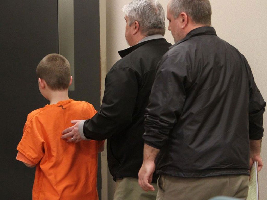 The boy appears at a juvenile court in Port Orchard, Washingston state accompanied by his family