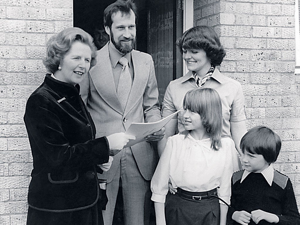 Margaret Thatcher hands over the deeds of a former council house in 1979, a watershed year for the would-be homeowners