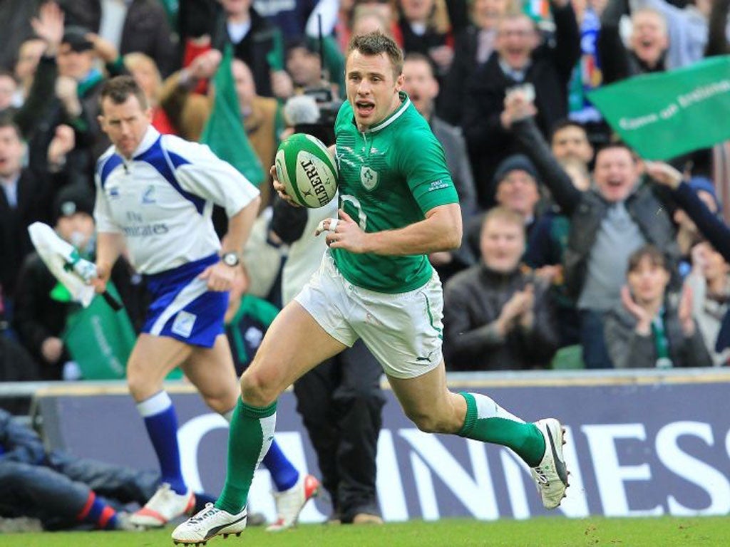 Tommy Bowe runs in for one of his two tries as Ireland score five against Italy in Dublin