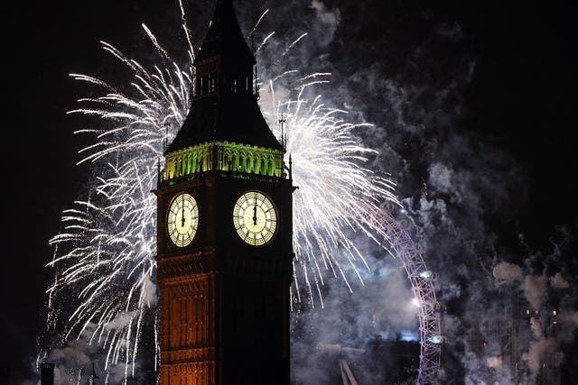 Fireworks explode over the Houses of Parliament