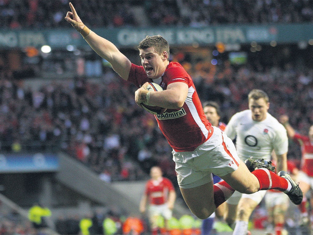 Scott Williams flies in to score the only try of the match in Wales's victory at Twickenham