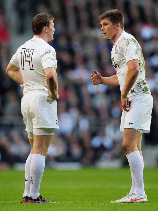 England fly-half Owen Farrell (right) makes a point to the wing Chris Ashton during the 19-12 defeat by Wales at Twickenham