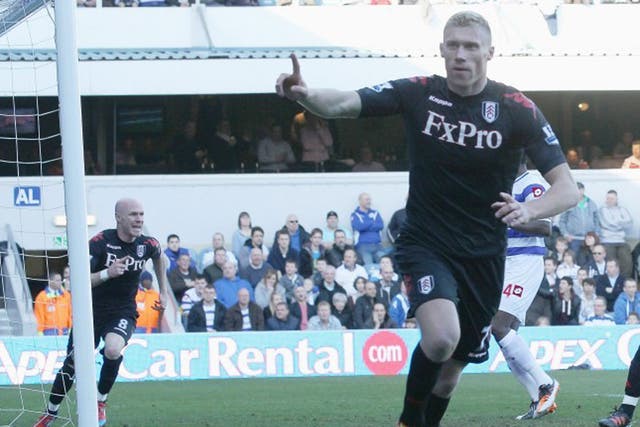 QPR's Pavel Pogrebnyak celebrates after his seventh-minute goal