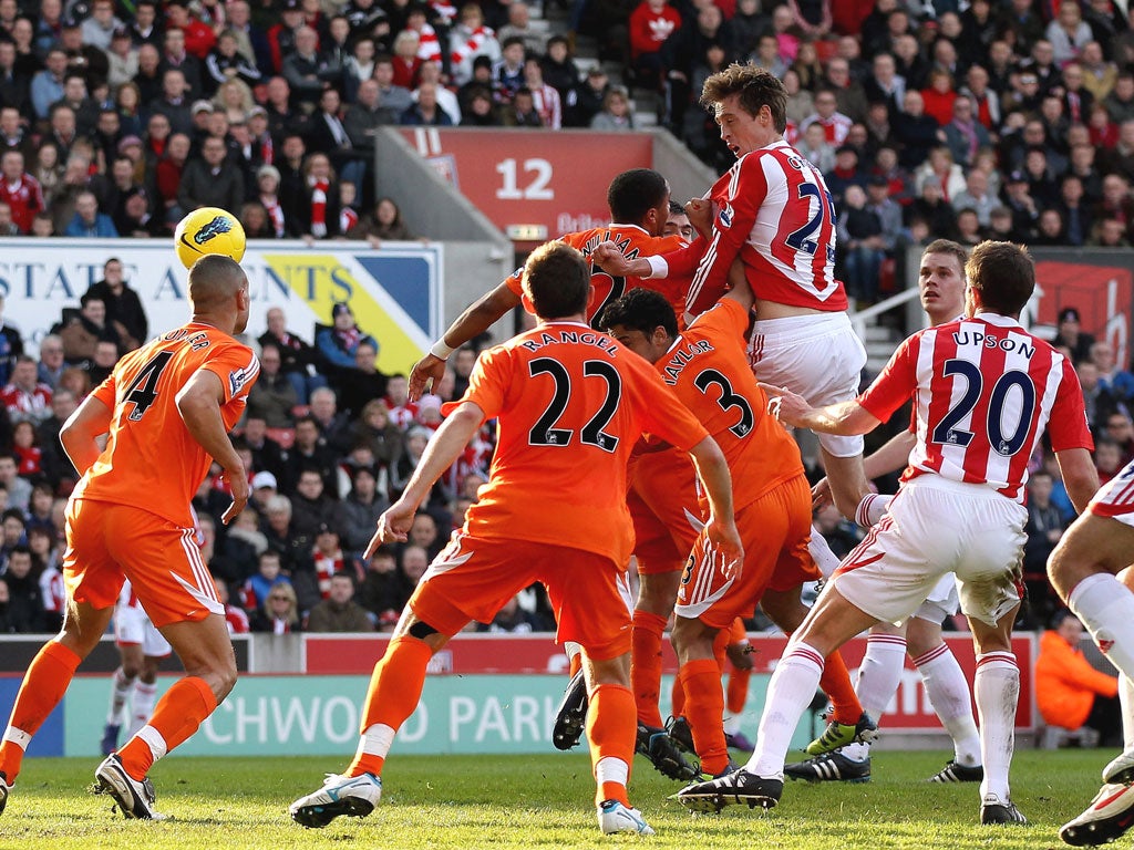 Peter Crouch rises highest to extend Stoke’s lead against Swansea
