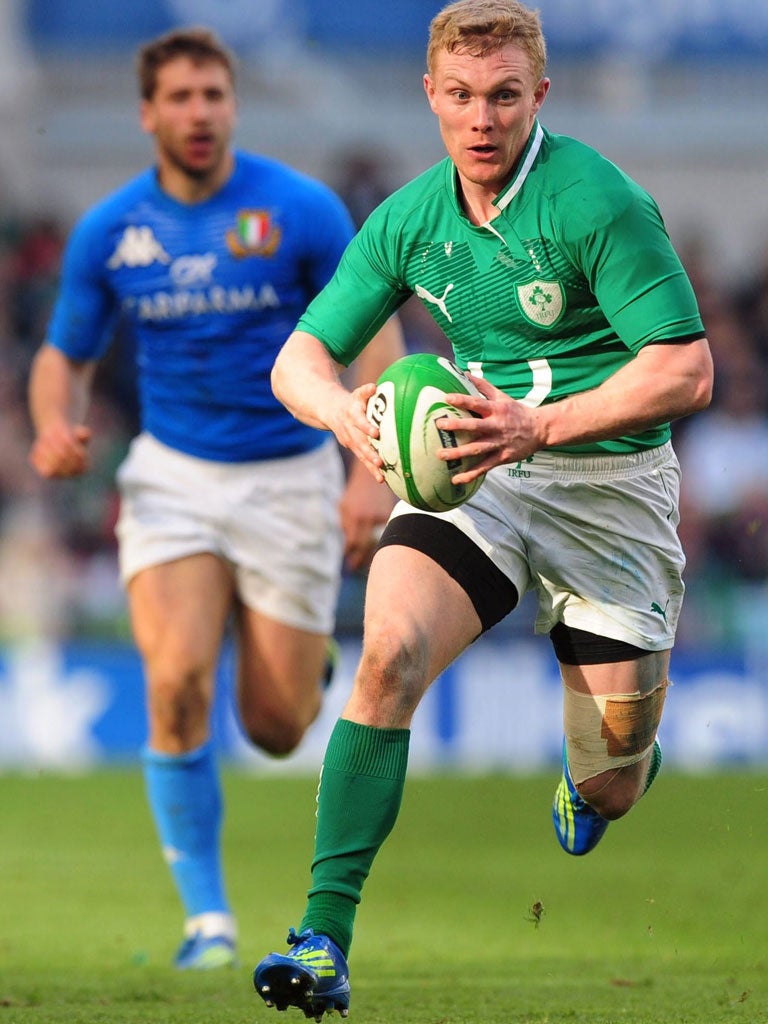 Ireland’s Keith Earls makes a break against Italy in Dublin