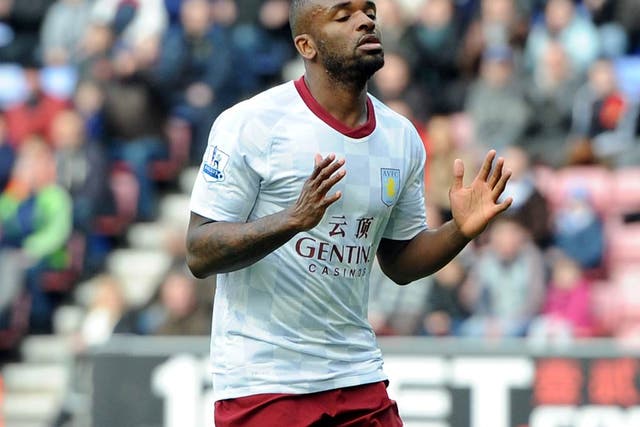 Darren Bent will miss England's friendly with Holland