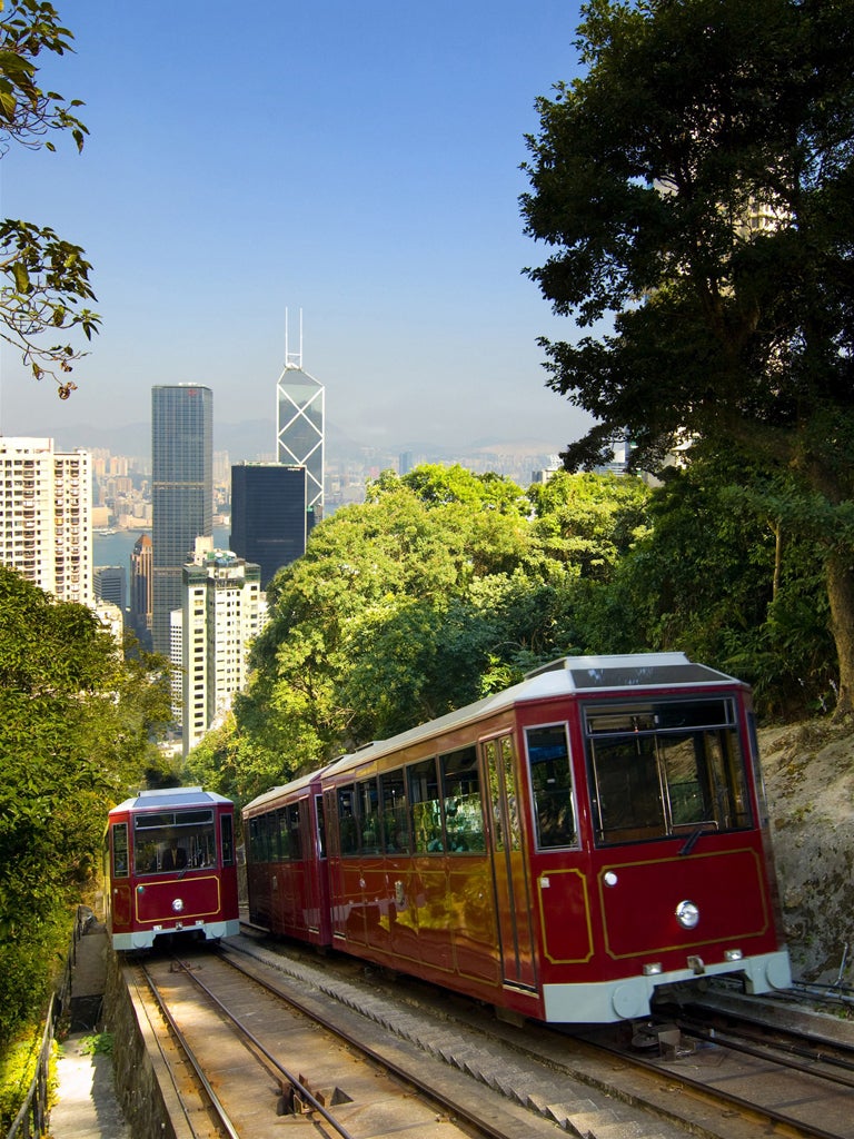 The Peak Tram wends its way up Hong Kong Island
