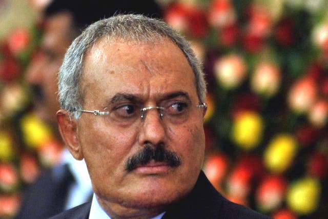 Former Yemeni president Ali Abdullah Saleh looks on after he formally handed power to newly elected president Abdo Rabbo Mansour Hadi