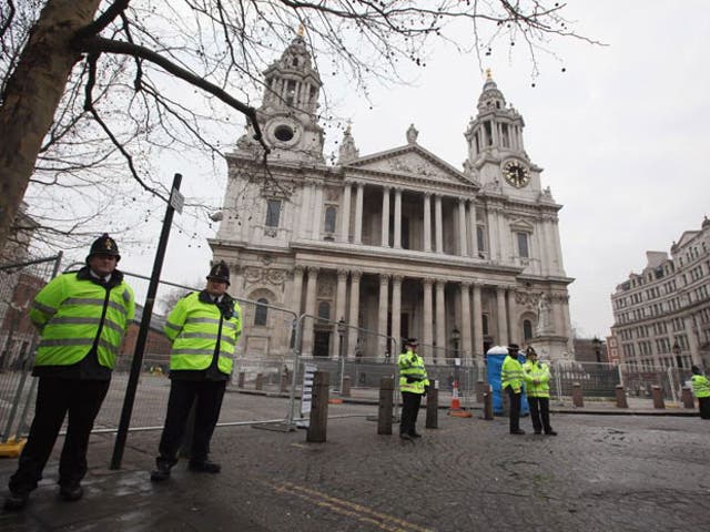 Police stand guard in front of St Paul's Cathedral