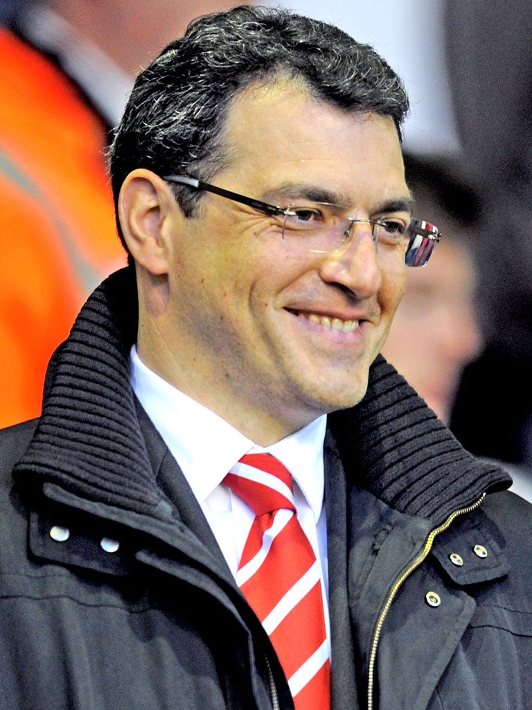 Comolli says Kenny Dalglish has 'done a tremendous job to put the team back on track'