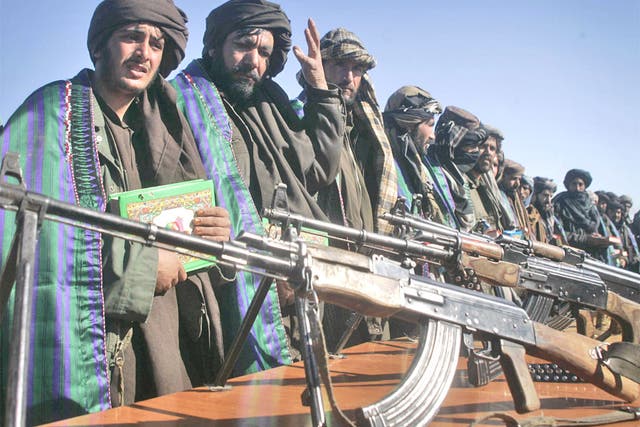 Weapons are handed in by former Taliban fighters as part of the reconciliation efforts of the Afghan government in Herat in January