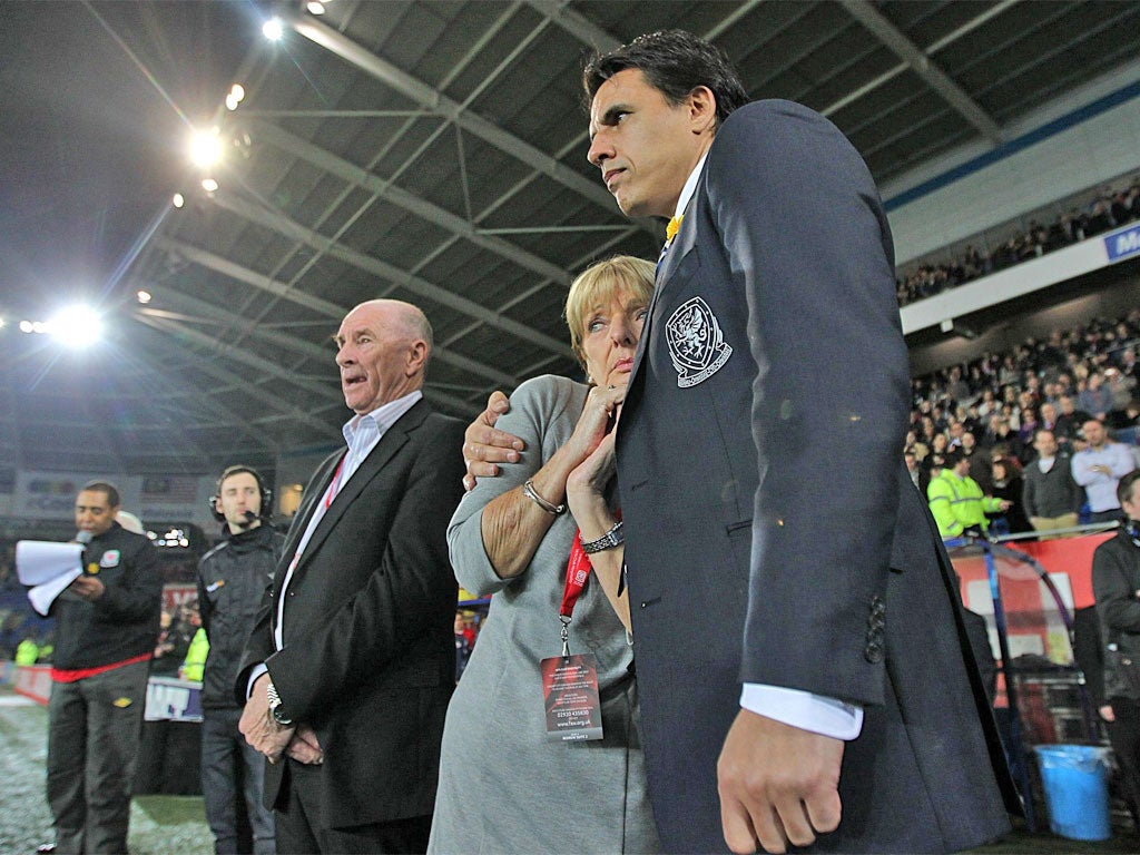 Wales manager Chris Coleman with Gary Speed's parents Carol and Roger