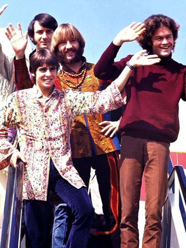 The Monkees land in Japan for a tour in 1968: from left, Jones, Mike Nesmith (behind Jones), Peter Tork and Mickey Dolenz