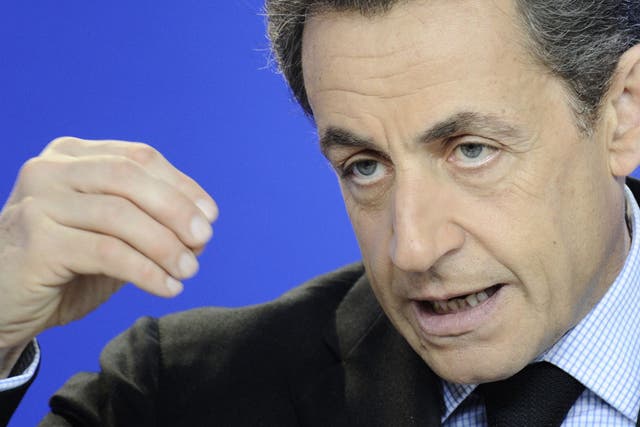 President Sarkozy speaks at an EU summit in Brussels yesterday
