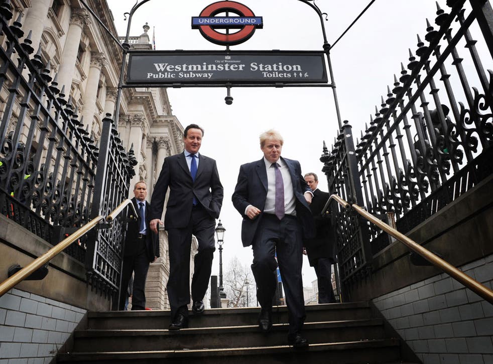 Cameron and Johnson on their way to the party forum yesterday