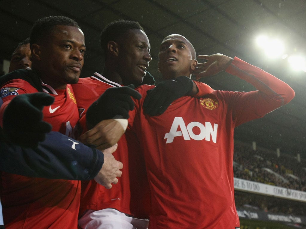 Ashley Young (R) of Manchester United celebrates scoring their third goal