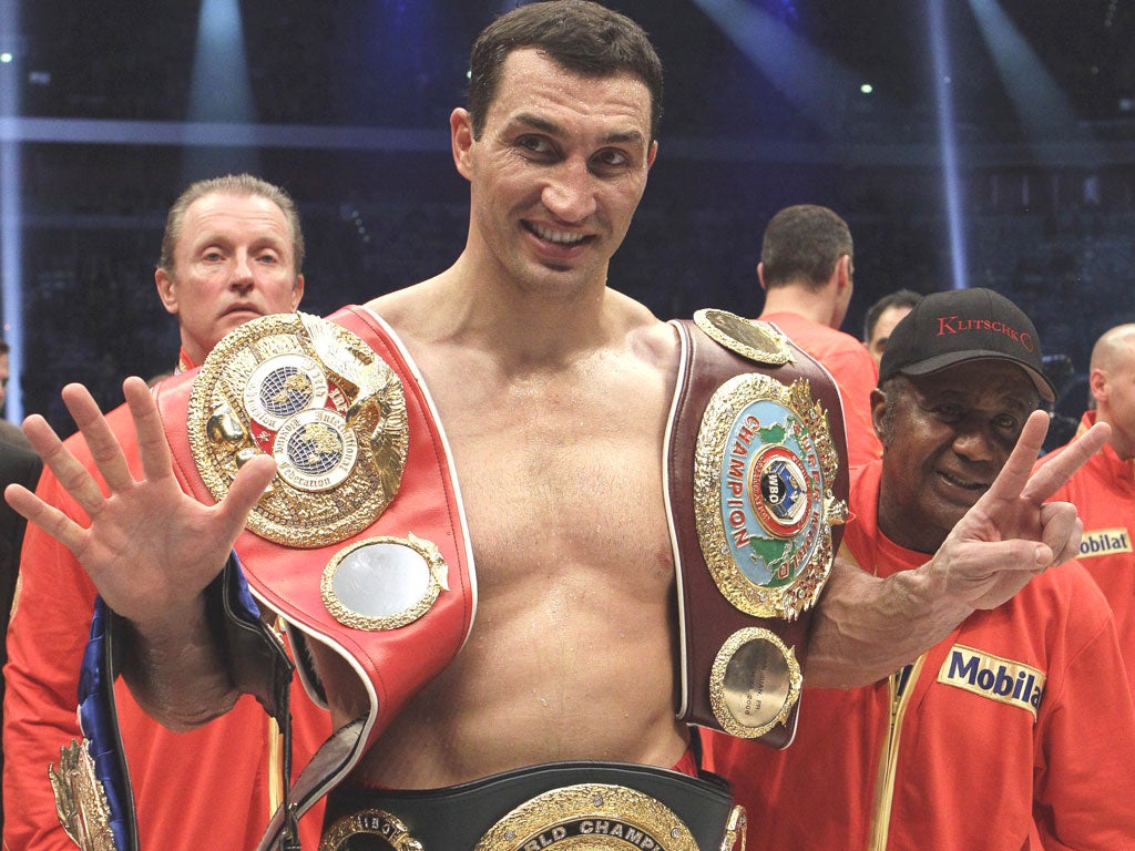 Wladimir Klitschko retained his heavyweight titles with a knockout