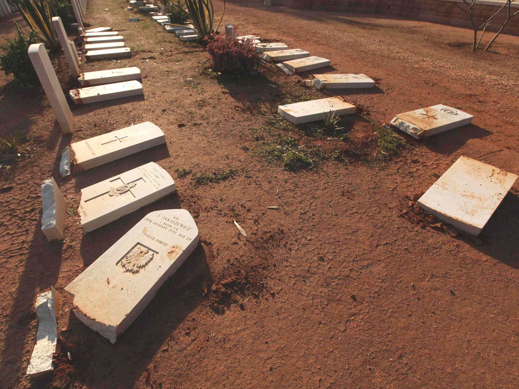 The vandalised graves at Benghazi Military Cemetery