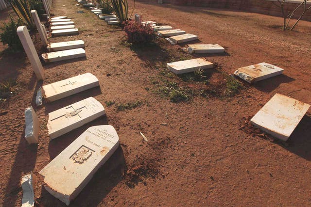 The vandalised graves at Benghazi Military Cemetery