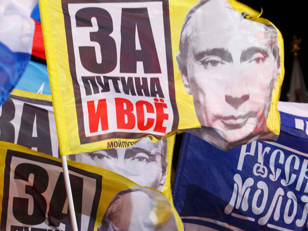 Vladimir Putin’s supporters rally in Manezhnaya Square last night