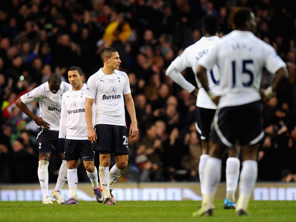 A dejected Tottenham after defeat to Manchester United