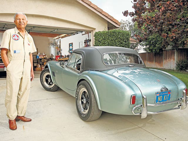 Former jazz musician and racing driver Hank Williams with his
Shelby Cobra MkII