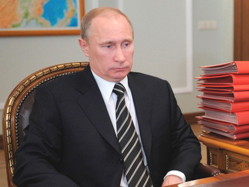 VLADIMIR PUTIN: The Russian leader’s supporters danced outside
the Kremlin