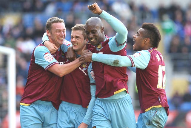 West Ham’s George Mc Cartney (second left) celebrates his goal
against Cardiff City in the 2-0 win at the weekend