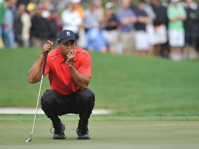 Tiger Woods waits to putt during the final round of the
Honda Classic, where he was in storming form