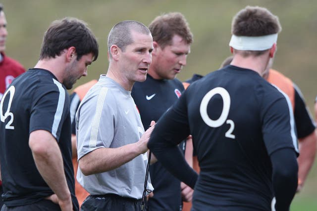 Stuart Lancaster, the England head coach, talks to his team at Pennyhill Park this week