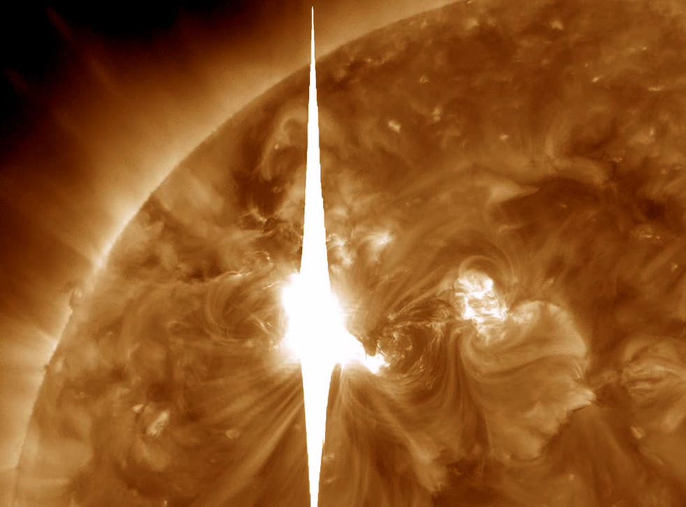 A solar flare such as this one threatens to cause disruption to power services on Earth today, particularly in the polar regions