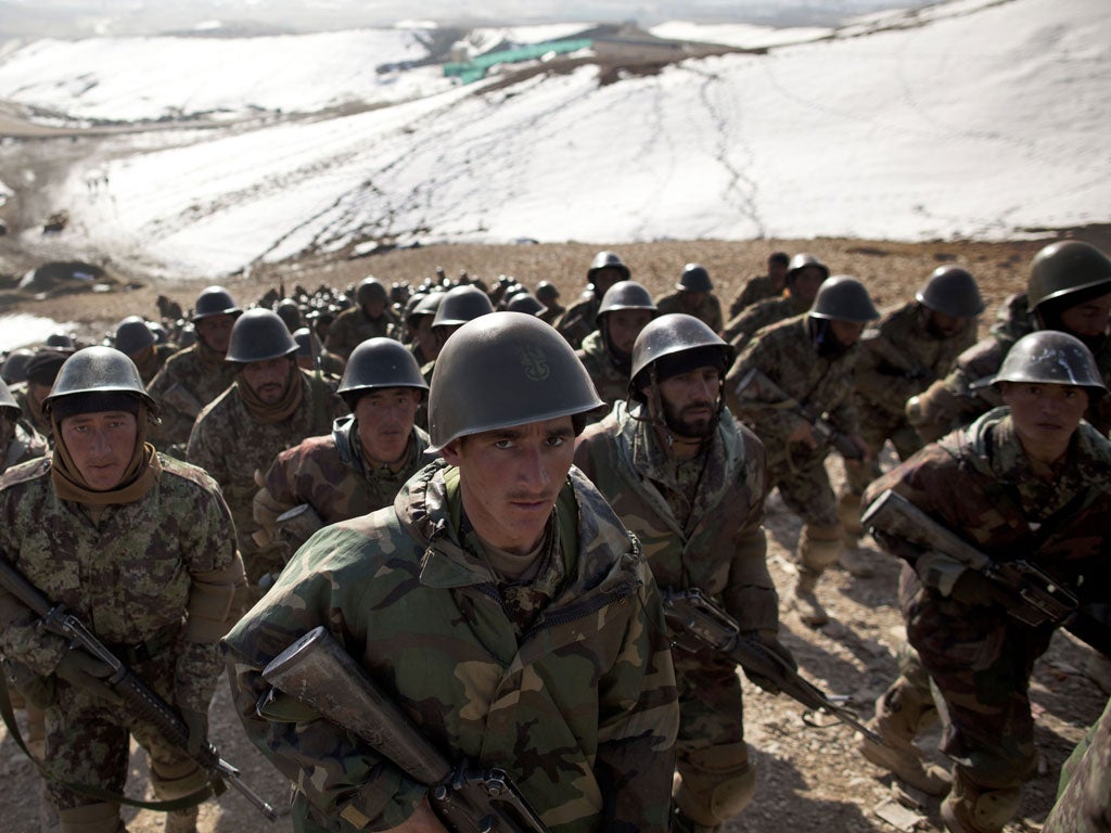 Afghan soldiers, seen here training, will be on their own after international troops withdraw in 2014