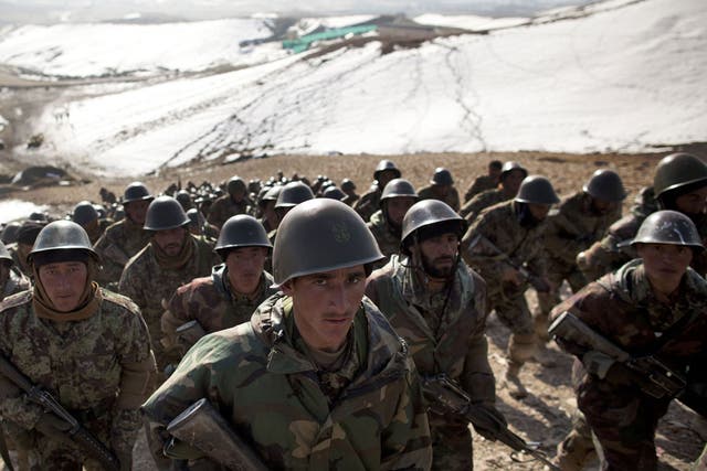 Afghan soldiers, seen here training, will be on their own after international troops withdraw in 2014