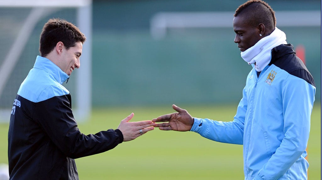 Mario Balotelli: "So Samir, if I win this game of slapsies, I get the snood...?" (09/03/12) To enter the current caption competition, click here.