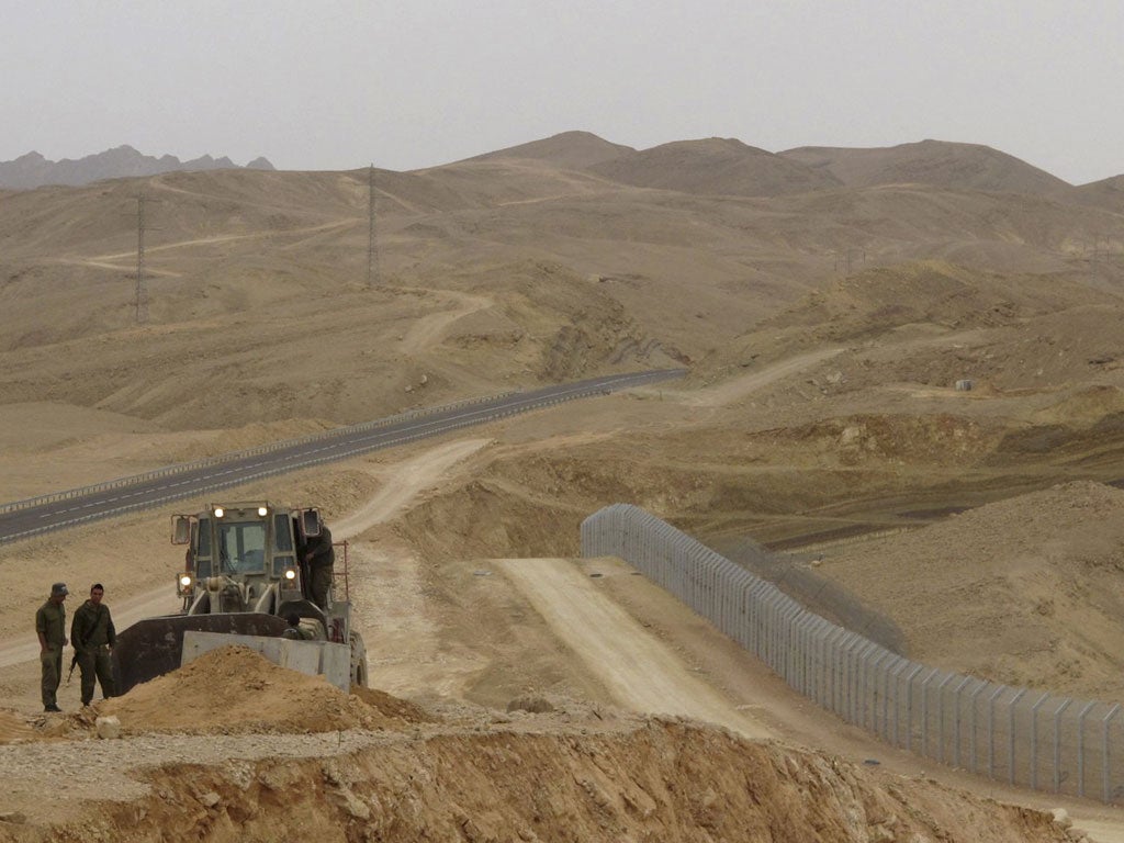 Israel is building a fence to stop migrants crossing from Egypt