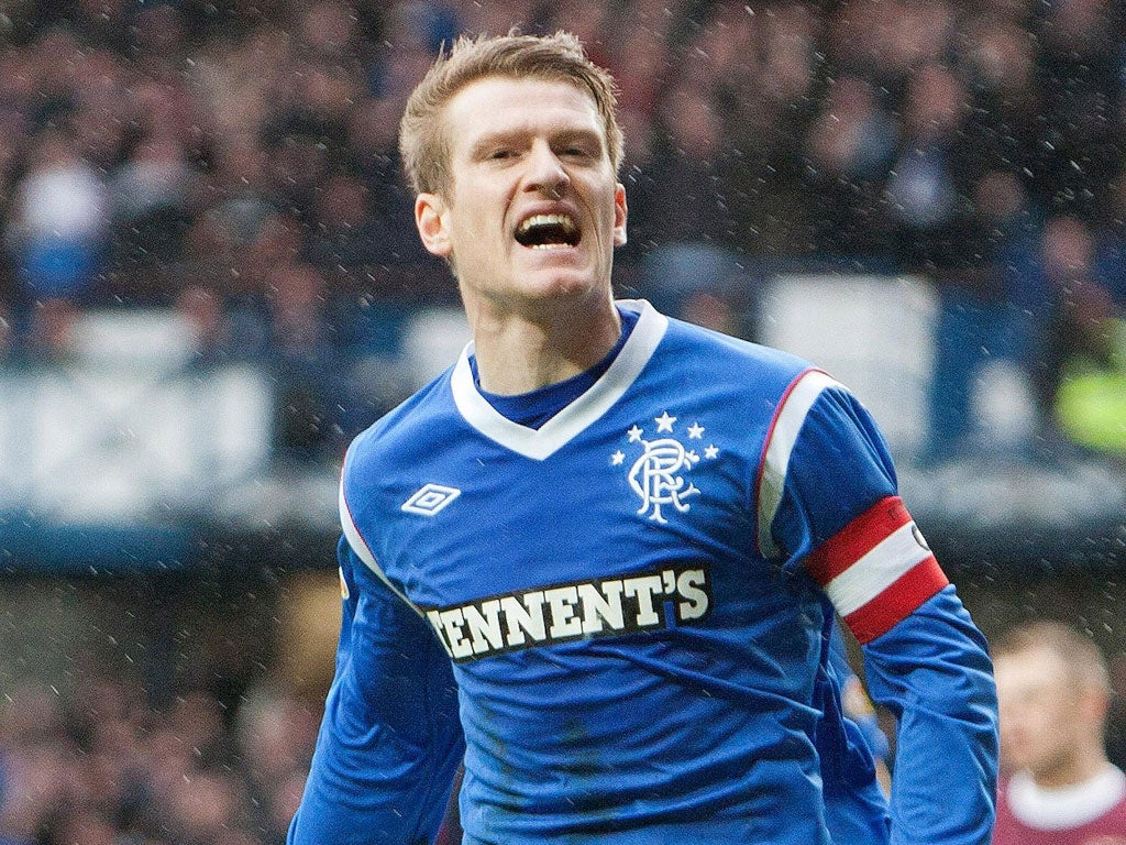 Rangers' captain Steven Davis is believed to be agreeing to take a 75 per cent wage cut
