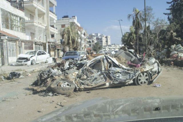 Destroyed cars in Homs