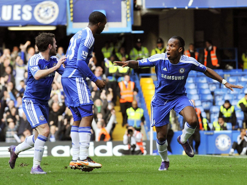 Didier Drogba is ecstatic after reaching a century of Premier League goals