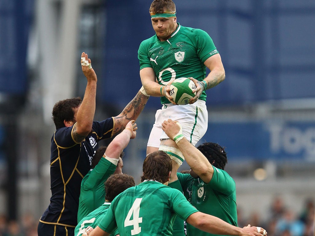 Up and away: No 8 Jamie Heaslip wins possession at a line-out for Ireland against Scotland at the Aviva Stadium