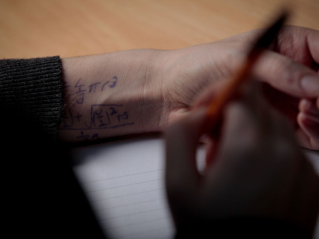 Using a mobile phone is one way to pass your exams, but notes on the arm will do